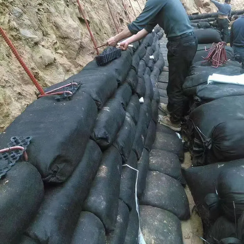 Industri 40*80cm Geotekstil Geobag untuk Perlindungan lereng jalan raya Geotekstil Geobag Perhutanan Menanam Rumput Pengendalian Banjir Geotekstil Geobag 7
