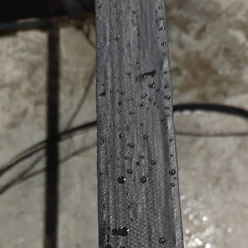 Cost-Effective Polymeric Geocomposite Strip Geogrid for Reinforced Soil Structures 1