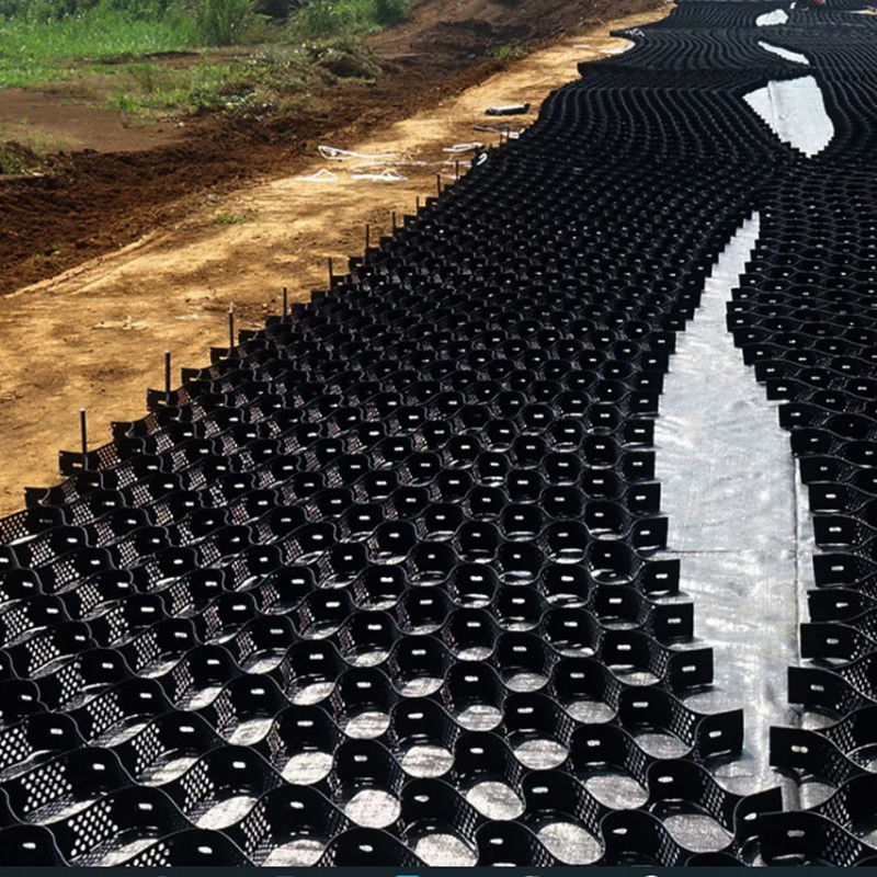 Tekstur Dengan Lubang Sistem Pengekang Seluler Tinggi Honeycomb HDPE Geocell Untuk Jalan Yayasan Perlindungan Lemparan Tempat parkir Jalan Pengendalian Tembok