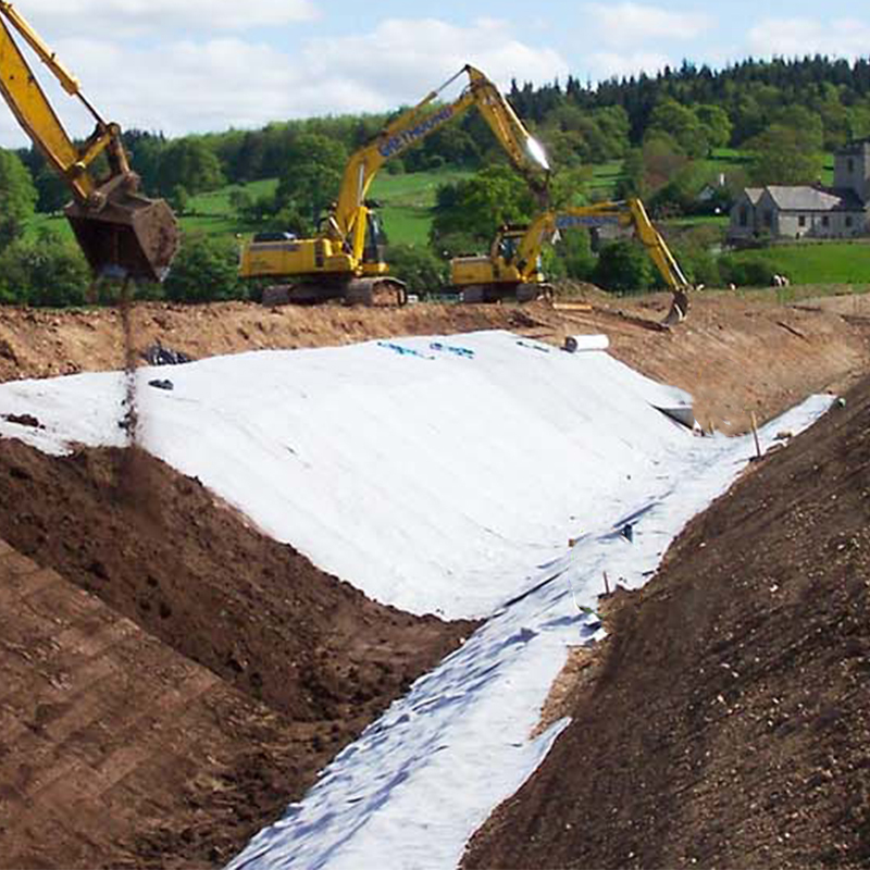 Geotekstil Kain Nonwoven Spunbond Pet/PP untuk Waduk Danau Buatan Kolam Limbah Tempat Pembuangan Akhir Filtrasi Isolasi